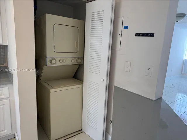 a view of multiple houses with a yard