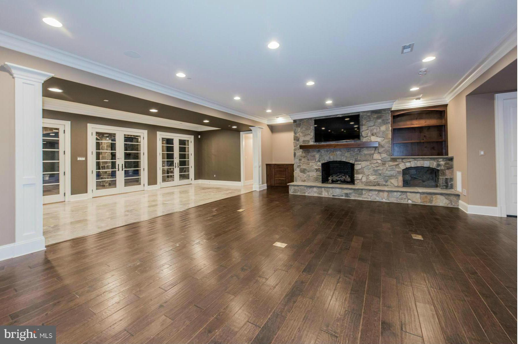 2684 Daisy Road Woodbine, MD 21797 - Photo 23 of 30 Basement w/gas FP w/full profile stone surround