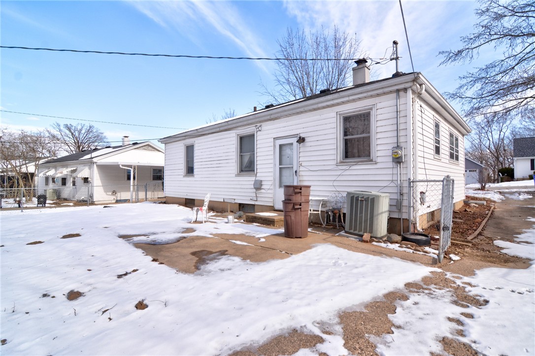47 1st South Shores Avenue Decatur, IL 62521 - Photo 24 of 24 a view of a house with snow on the road