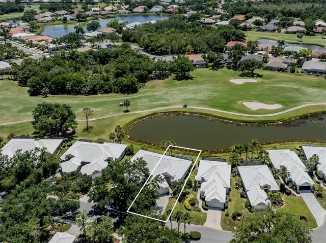 an aerial view of a house with a garden