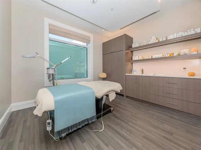 a view of a swimming pool with a backyard