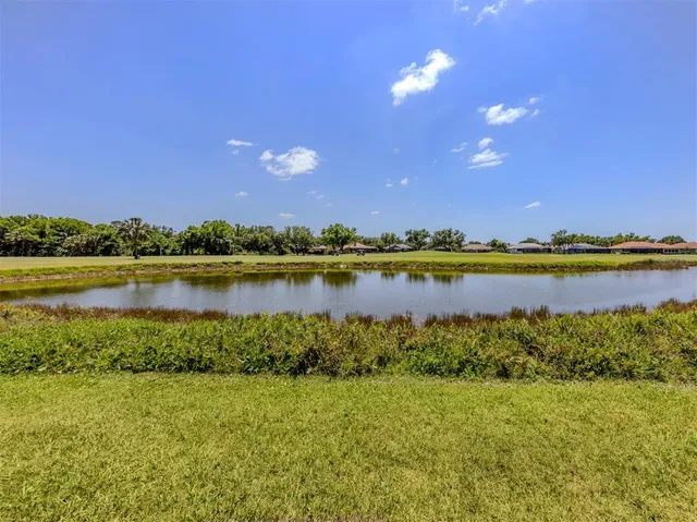 a view of a lake with a city