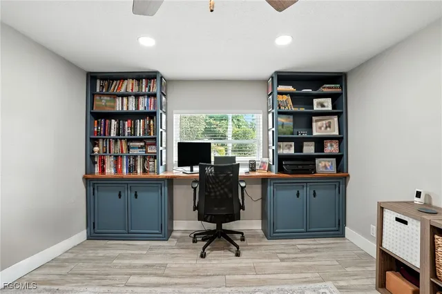a view of a workspace with furniture