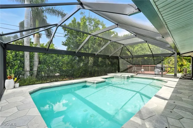 a view of a swimming pool with a porch