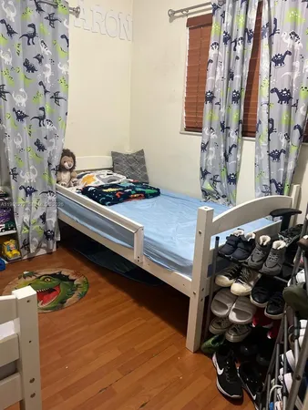 a view of a room with rug