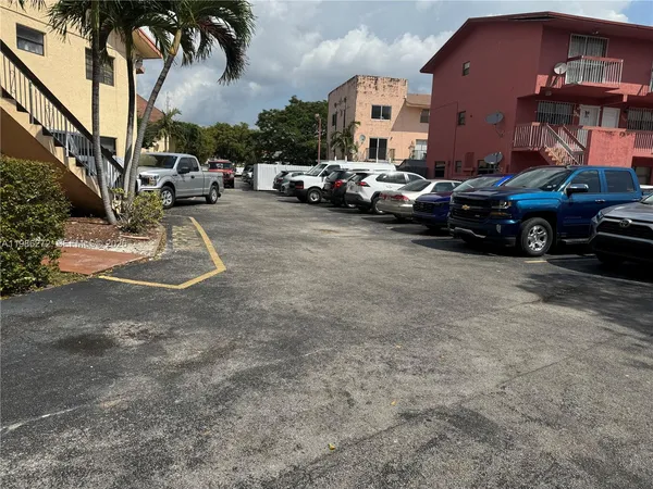 a view of a street with cars