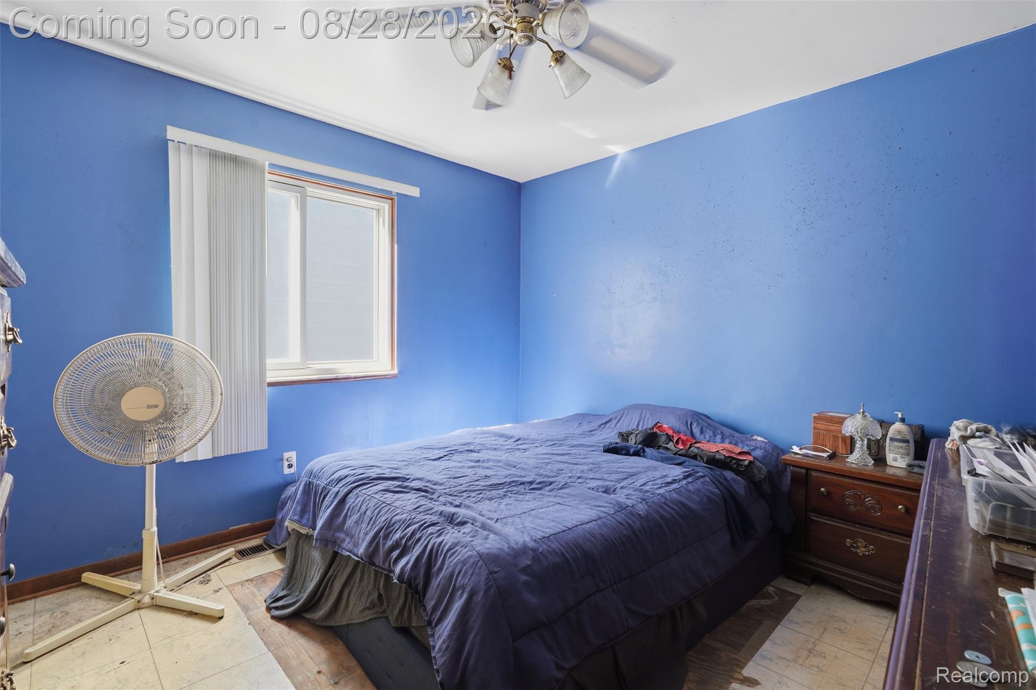 21353 Waltham Road Warren, MI 48089 - Photo 15 of 25 Ceiling fan with light fixture, window with vertical blinds, wall-mounted electrical outlet