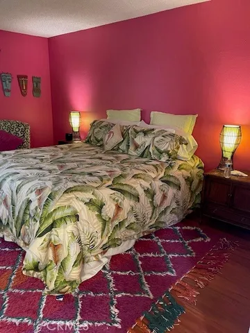 wooden floor with a bathroom