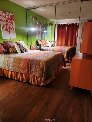 a kitchen with stainless steel appliances kitchen island granite countertop a sink and cabinets