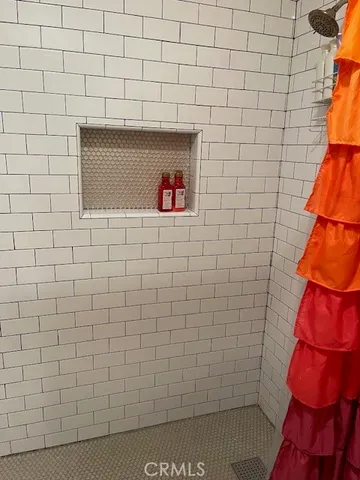 a view of an entryway with a fan