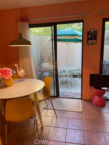 front view of a house with a bench