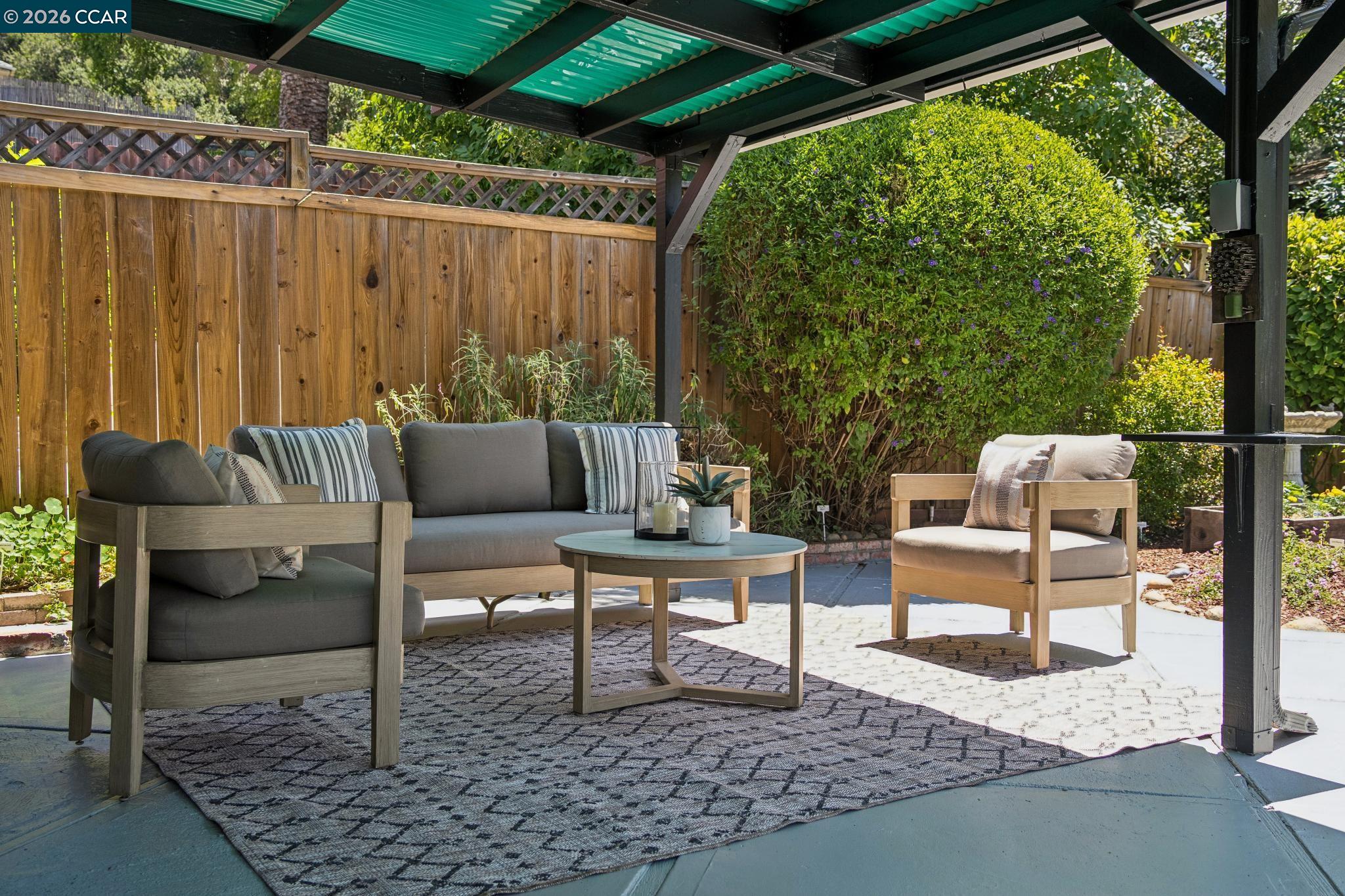 4034 Rusting Avenue Oakland, CA 94605 - Photo 36 of 52 a outdoor living space with furniture and a rug