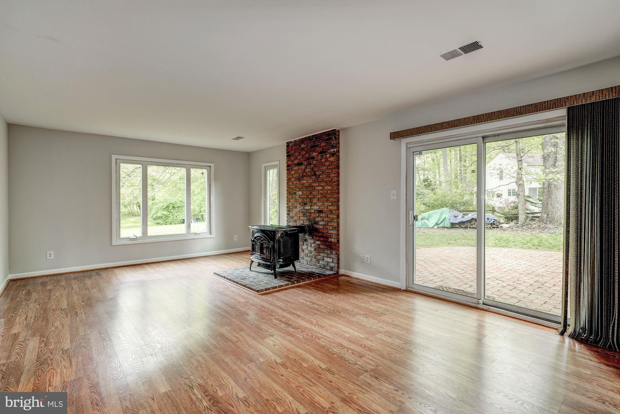 2013 Dundee Road Rockville, MD 20850 - Photo 20 of 31 Family Room w wood stove