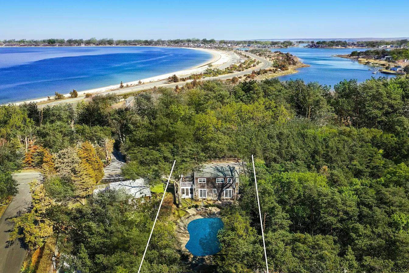 3752 Noyack Road Sag Harbor, NY 11963 - Photo 3 of 17 an aerial view of residential houses with outdoor space