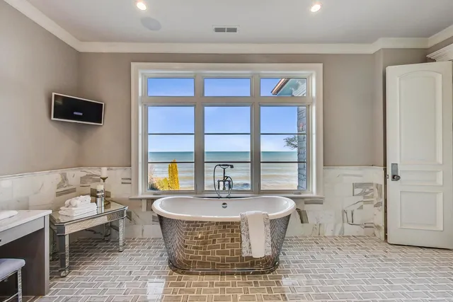 a dining room with a table and chairs