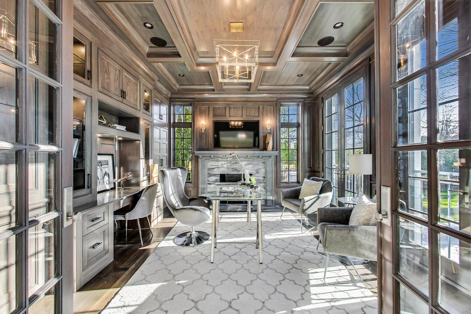 501 Sheridan Road Kenilworth, IL 60043 - Photo 15 of 20 a living room with fireplace furniture and a chandelier