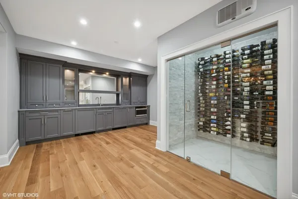 a bathroom with a sink and mirror