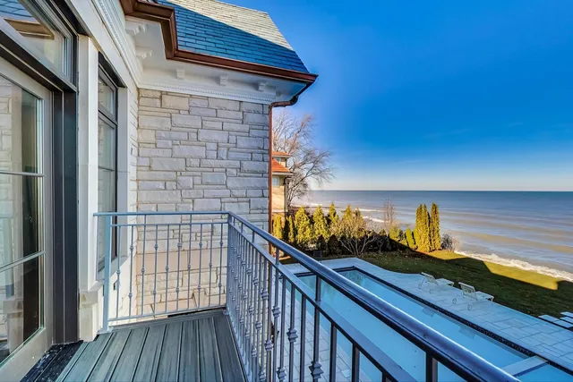 a outdoor living space with furniture and a flat screen tv