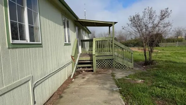 a view of entryway gate of a house