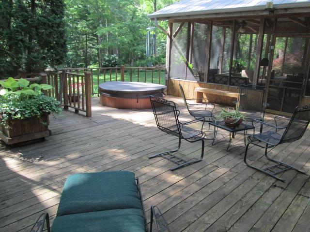 117 Hickory Hills Road Tullahoma, TN 37388 - Photo 16 of 20 Screened porch leads to a large deck with built in hot tub.