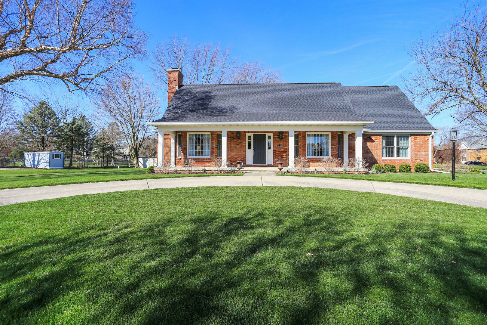 2711 North Salisbury Court Champaign, IL 61821 - Photo 1 of 42 front view of a brick house with a yard