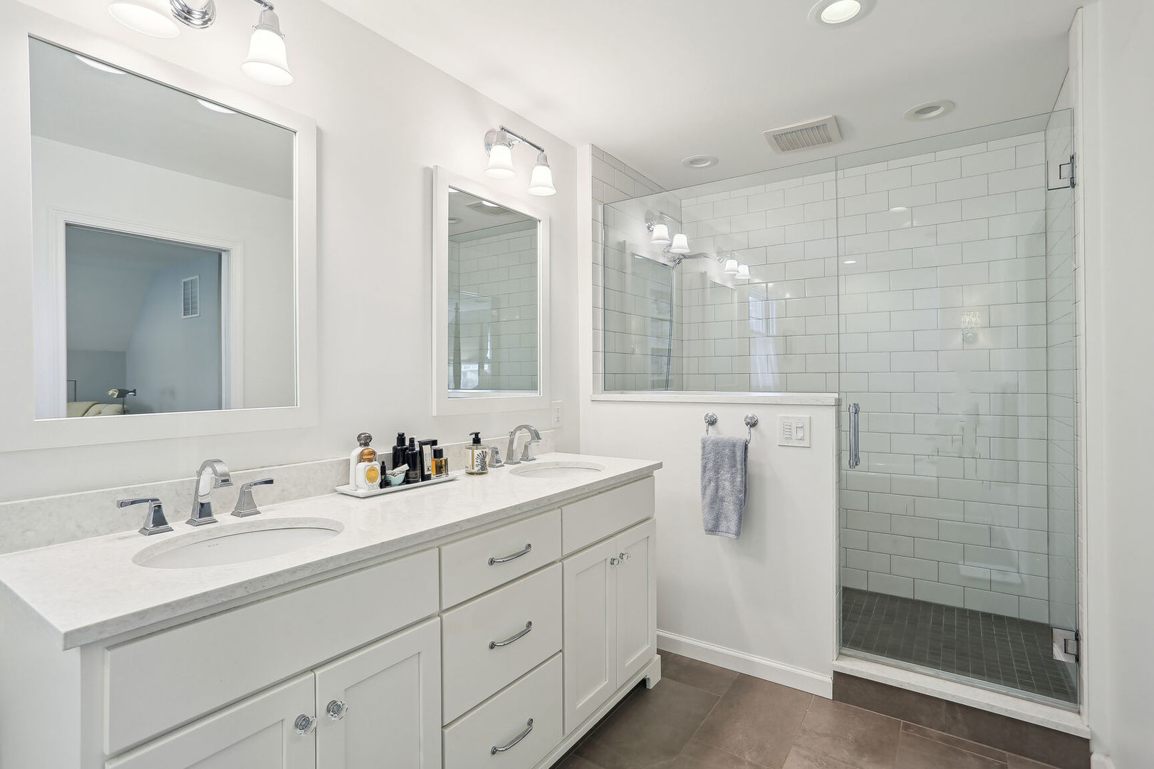 2711 North Salisbury Court Champaign, IL 61821 - Photo 28 of 42 a bathroom with a double vanity sink mirror and shower