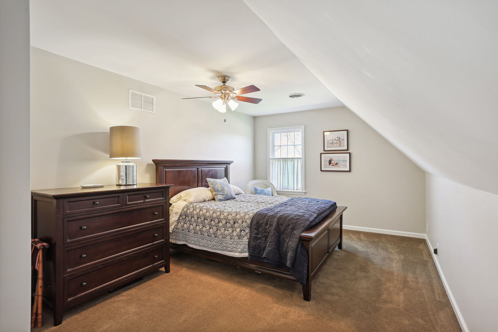 2711 North Salisbury Court Champaign, IL 61821 - Photo 30 of 42 a bedroom with a bed and a chandelier