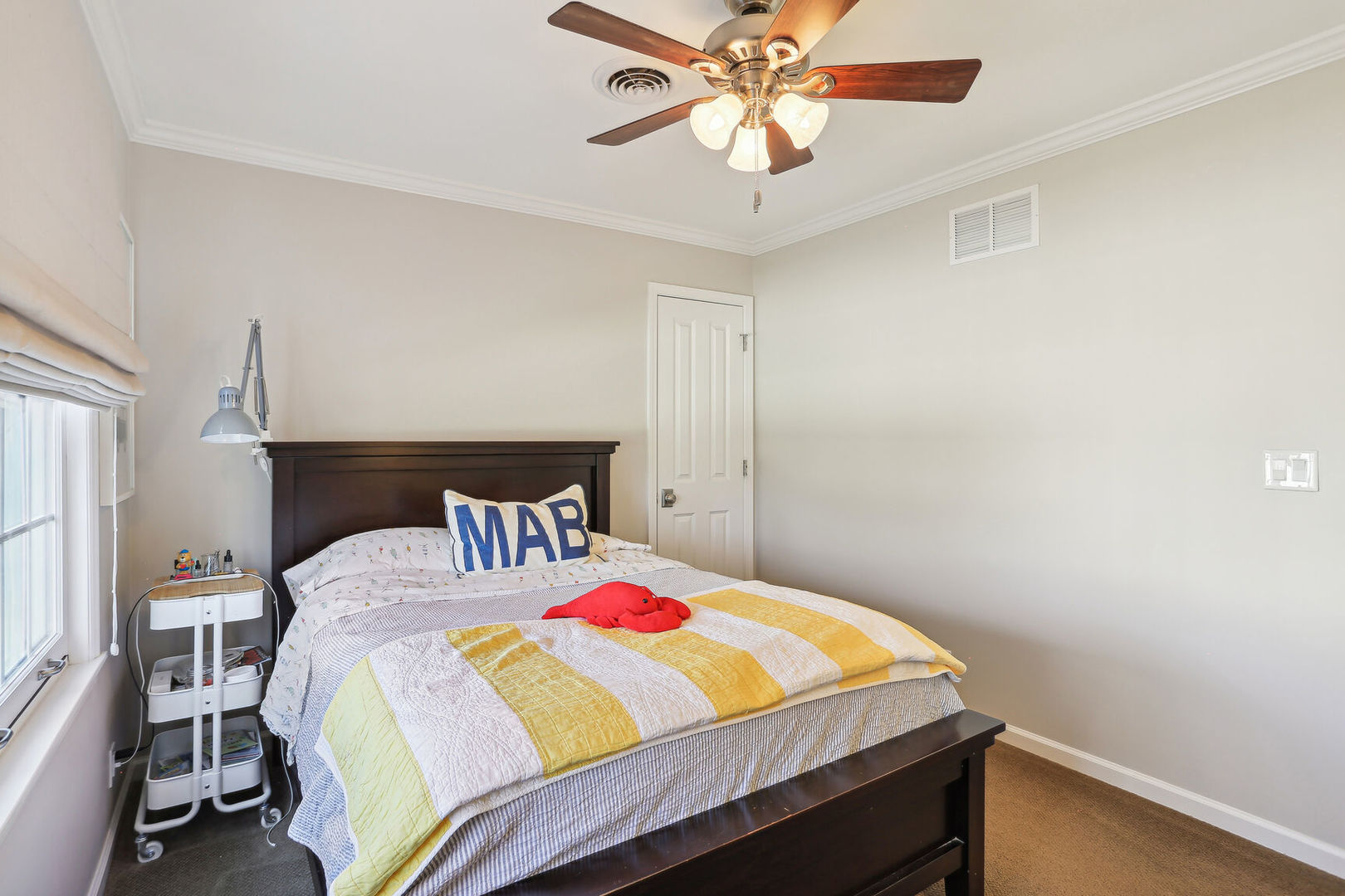 2711 North Salisbury Court Champaign, IL 61821 - Photo 32 of 42 a bedroom with a bed and a chandelier