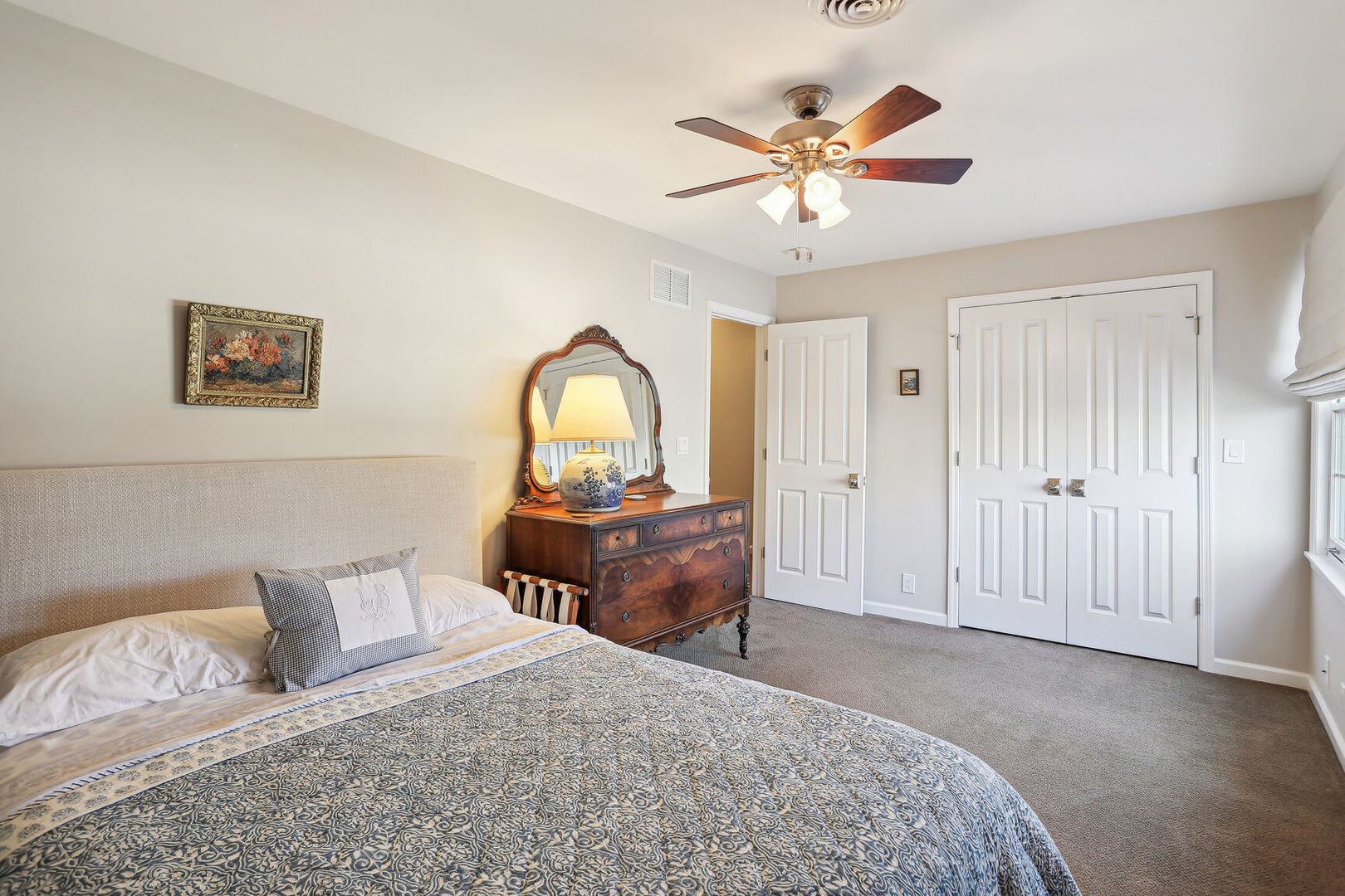 2711 North Salisbury Court Champaign, IL 61821 - Photo 35 of 42 a bedroom with a bed and a chandelier
