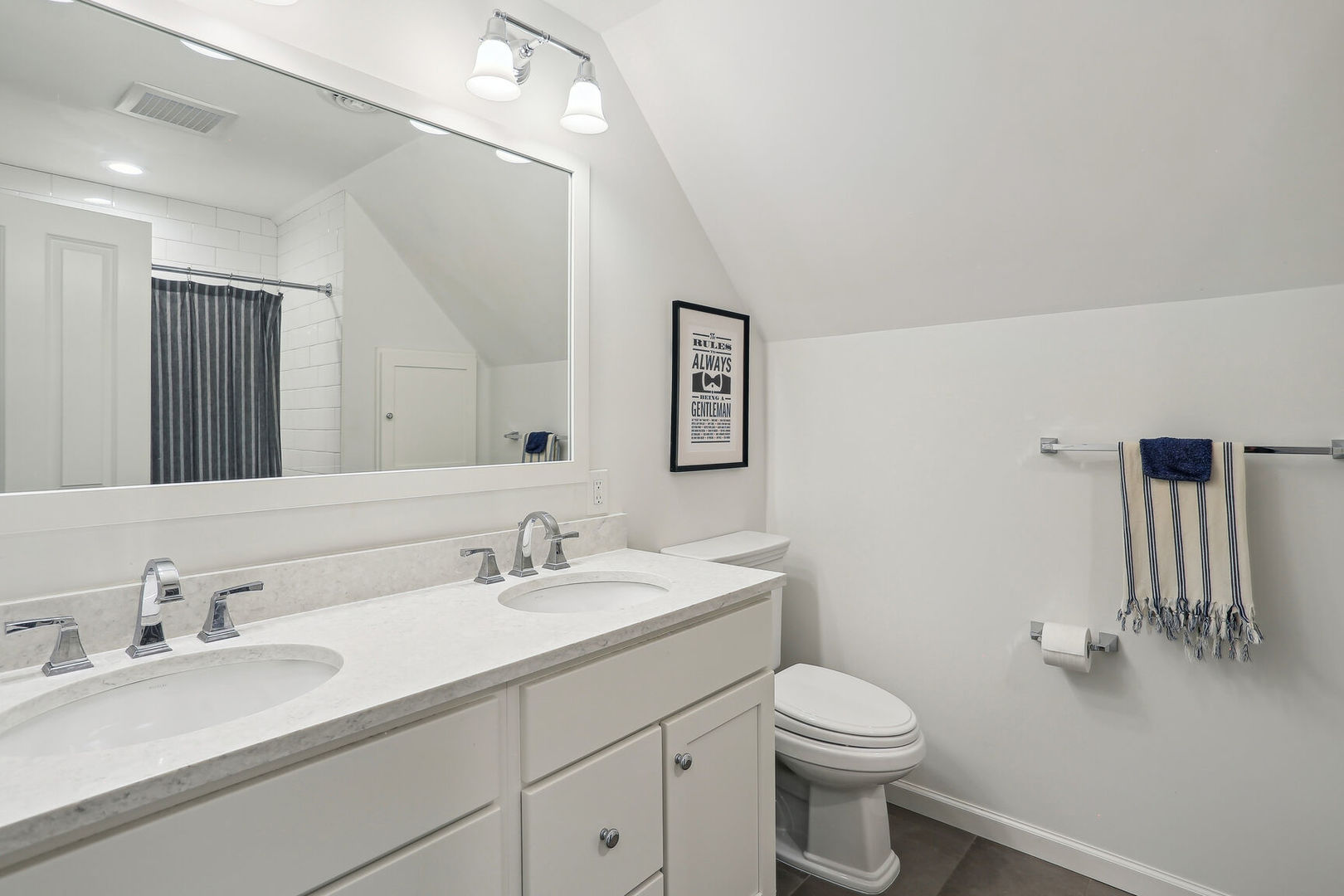 2711 North Salisbury Court Champaign, IL 61821 - Photo 36 of 42 a bathroom with a sink a toilet and mirror