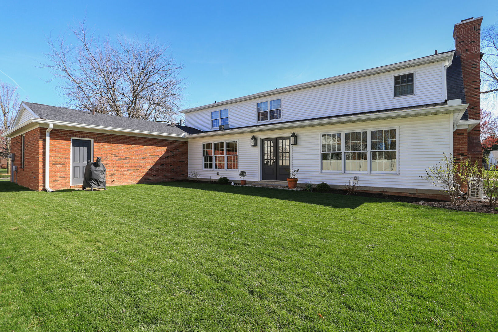 2711 North Salisbury Court Champaign, IL 61821 - Photo 41 of 42 a view of a house with backyard and a tree