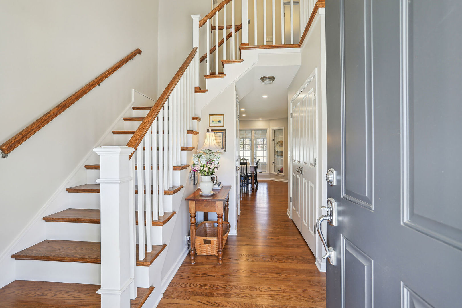 2711 North Salisbury Court Champaign, IL 61821 - Photo 6 of 42 a view of entryway and hall with wooden floor