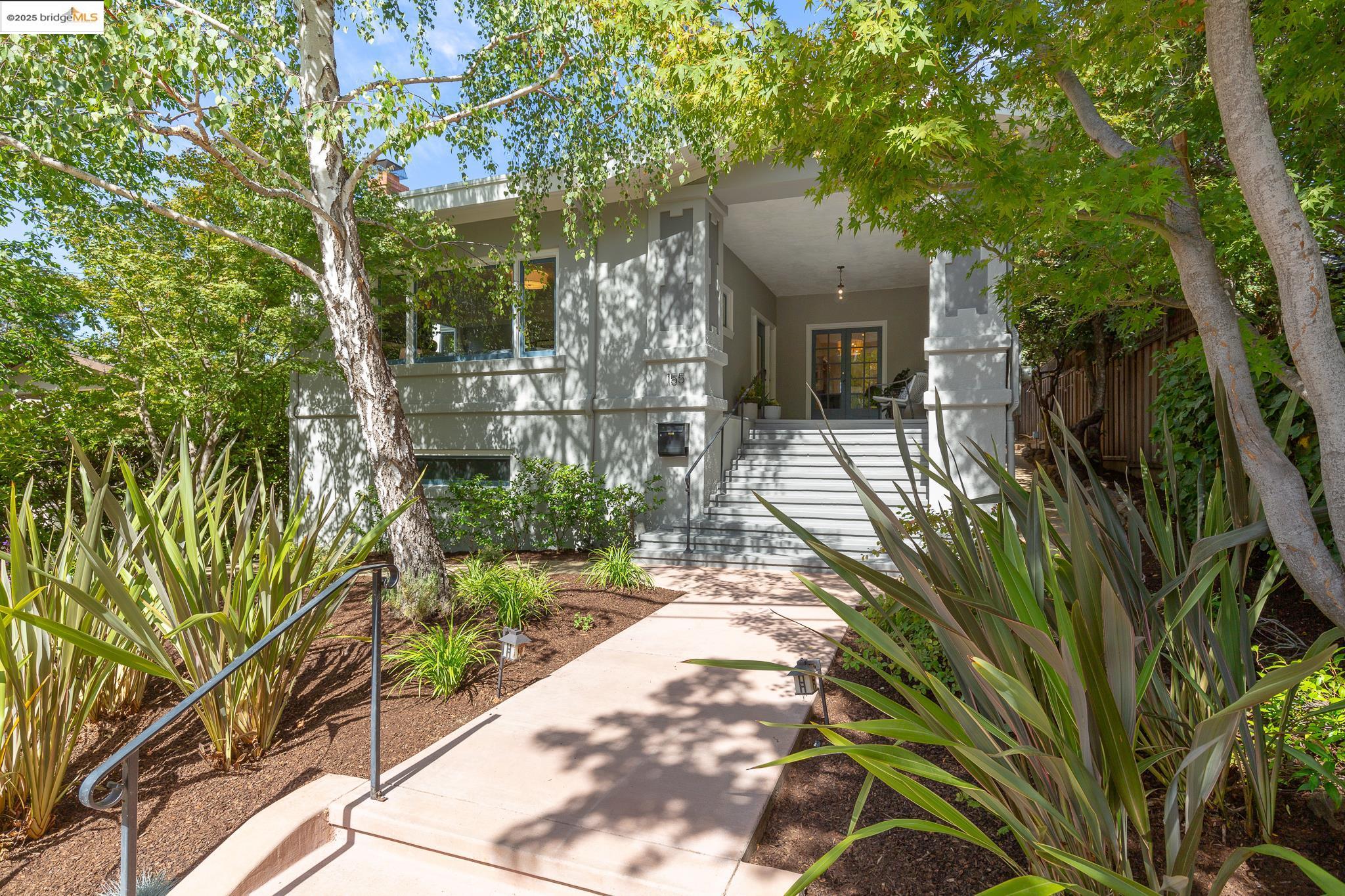155 Arbor Drive Piedmont, CA 94610 - Photo 1 of 1 a front view of a house with a yard