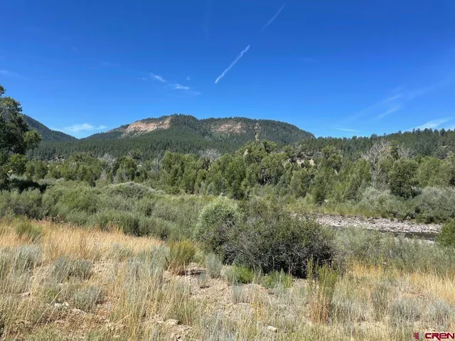 a view of a lake with a mountain