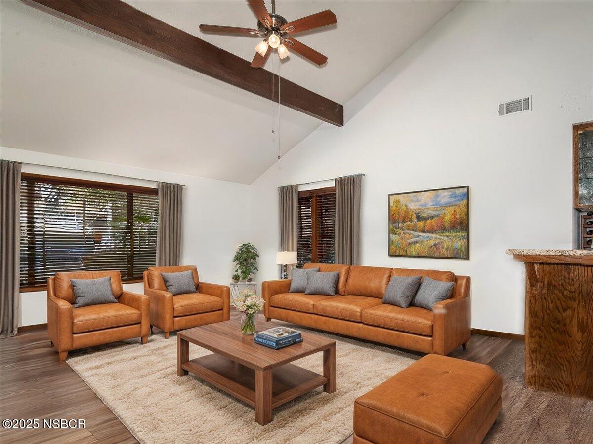 628 St Andrews Way Lompoc, CA 93436 - Photo 11 of 36 a living room with furniture and a large window