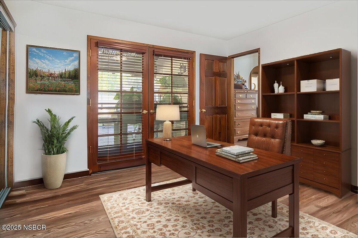 628 St Andrews Way Lompoc, CA 93436 - Photo 20 of 36 a living room with furniture and wooden floor
