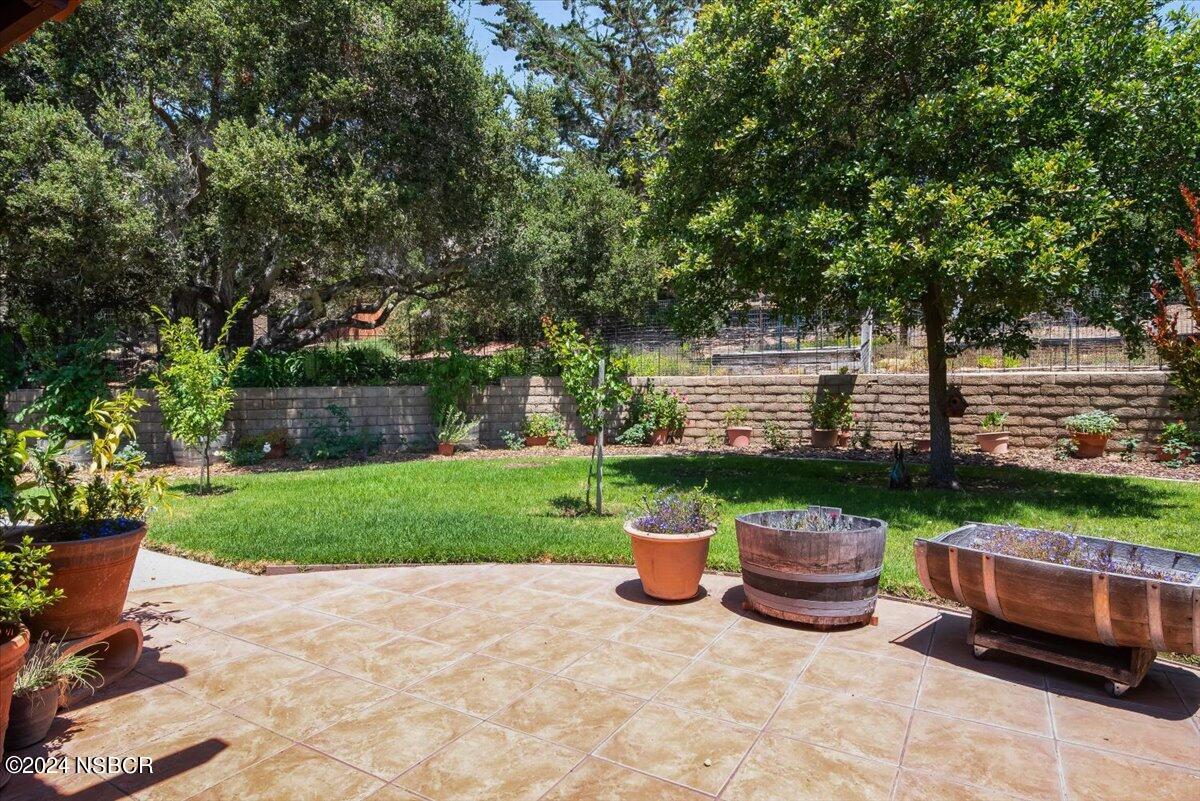 628 St Andrews Way Lompoc, CA 93436 - Photo 28 of 36 a view of a deck with furniture and plants