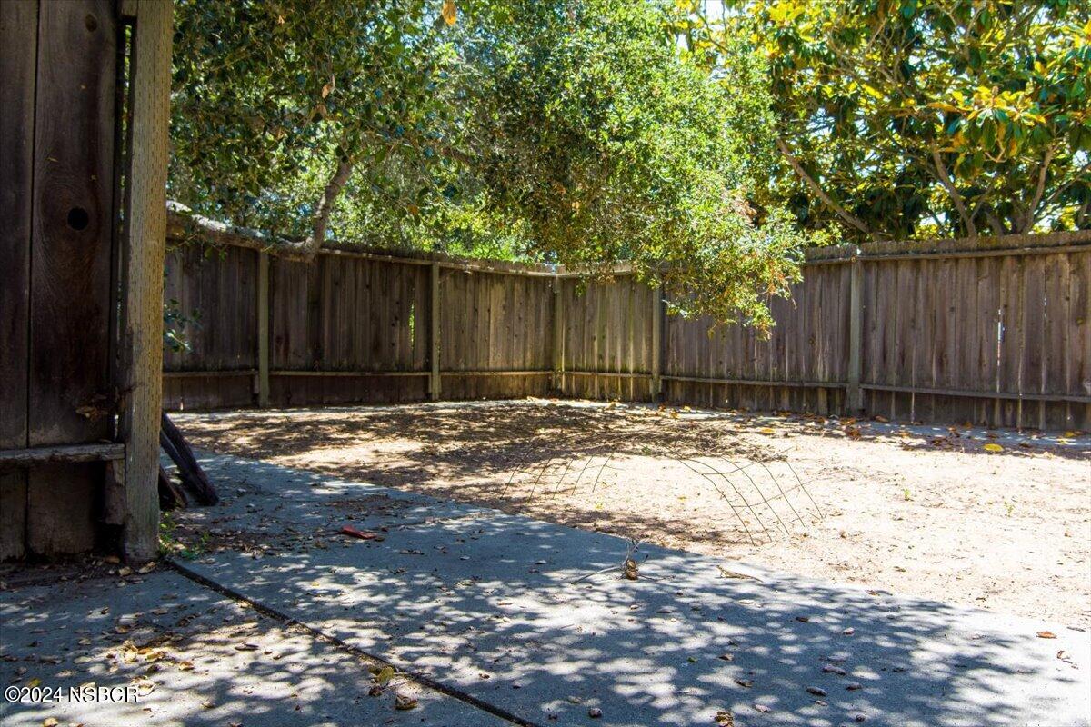 628 St Andrews Way Lompoc, CA 93436 - Photo 33 of 36 a view of small yard with wooden fence