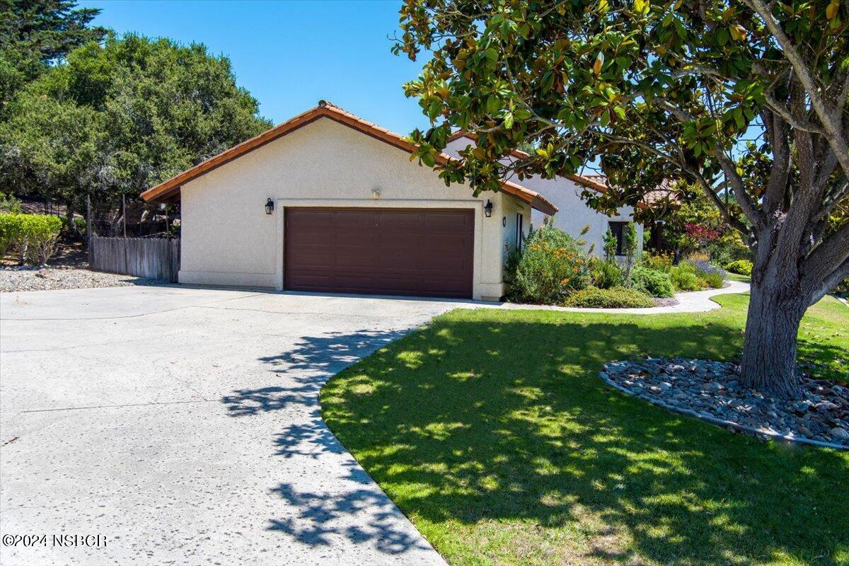 628 St Andrews Way Lompoc, CA 93436 - Photo 34 of 36 a front view of house with a garden