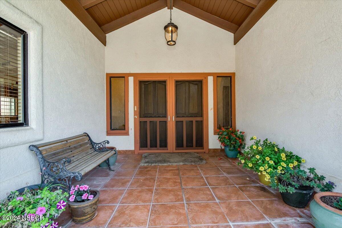 628 St Andrews Way Lompoc, CA 93436 - Photo 4 of 36 a view of a entryway door of the house