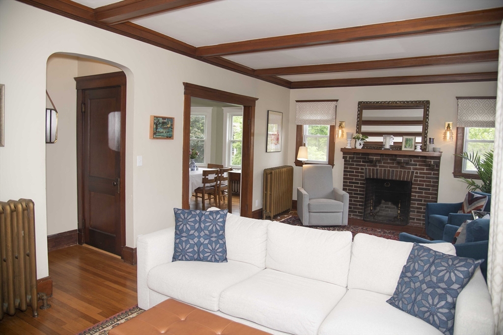 3 Chester Road, Unit 3 Belmont, MA 02478 - Photo 14 of 40 a living room with furniture and a fireplace