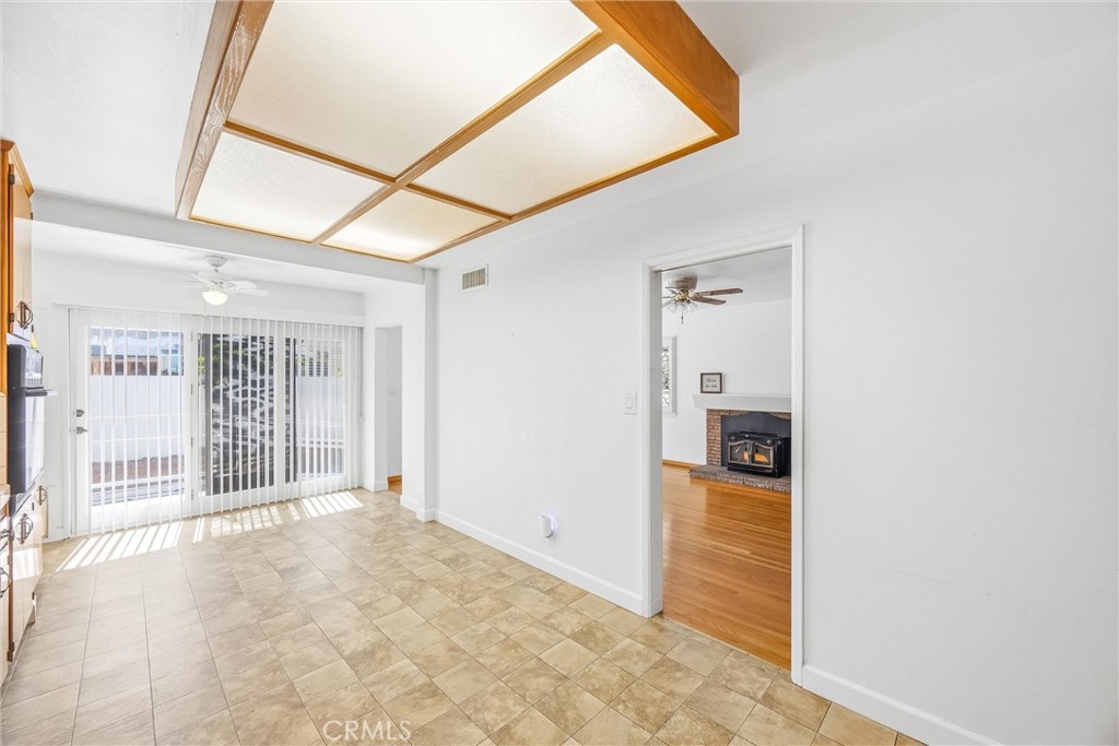 6730 Montclair Drive Riverside, CA 92504 - Photo 19 of 50 Inviting kitchen and dining area with easy access to the living room and sliding doors leading outdoors