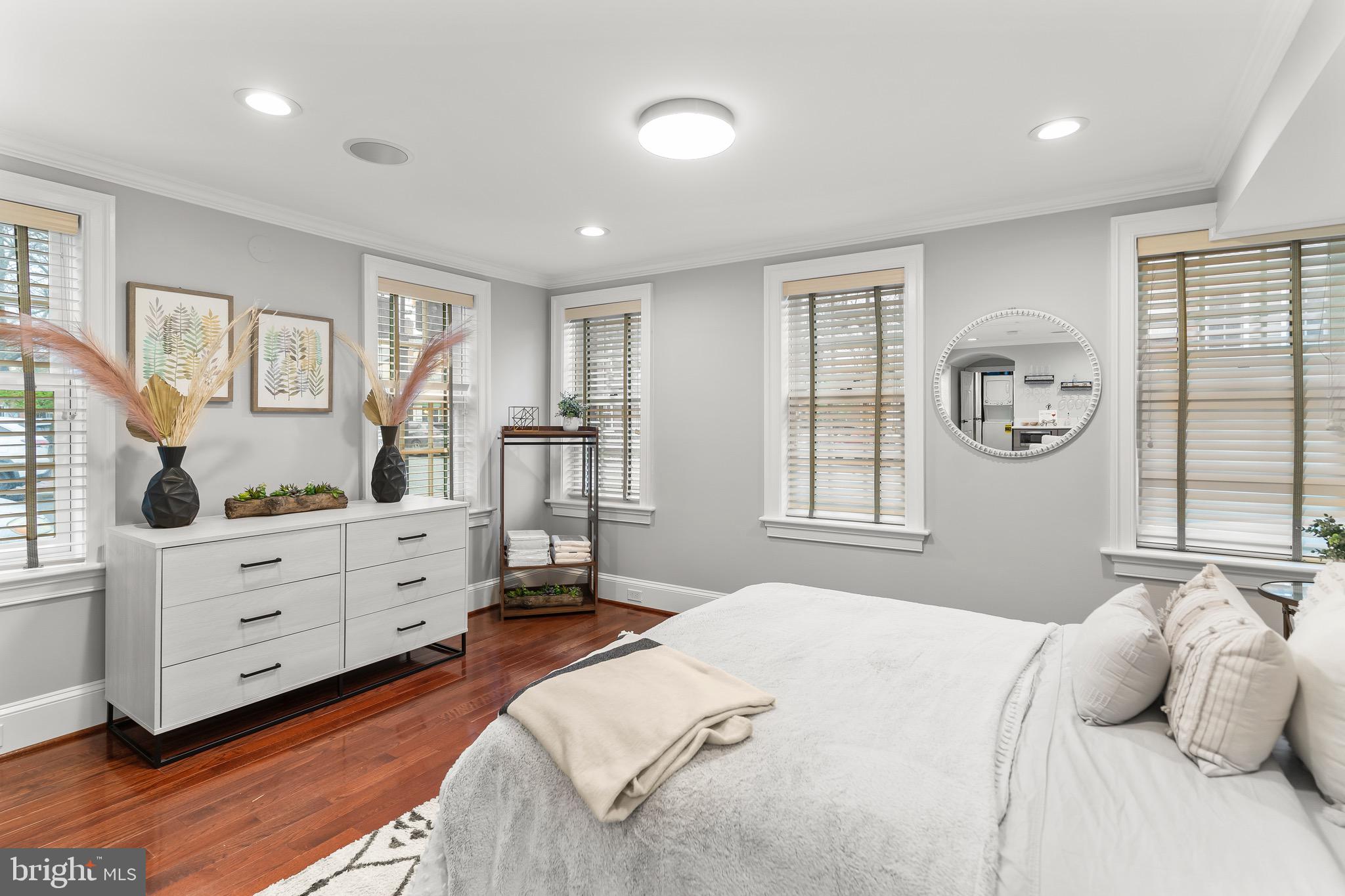 123 South Fayette Street Alexandria, VA 22314 - Photo 11 of 41 a bedroom with a bed and a large window