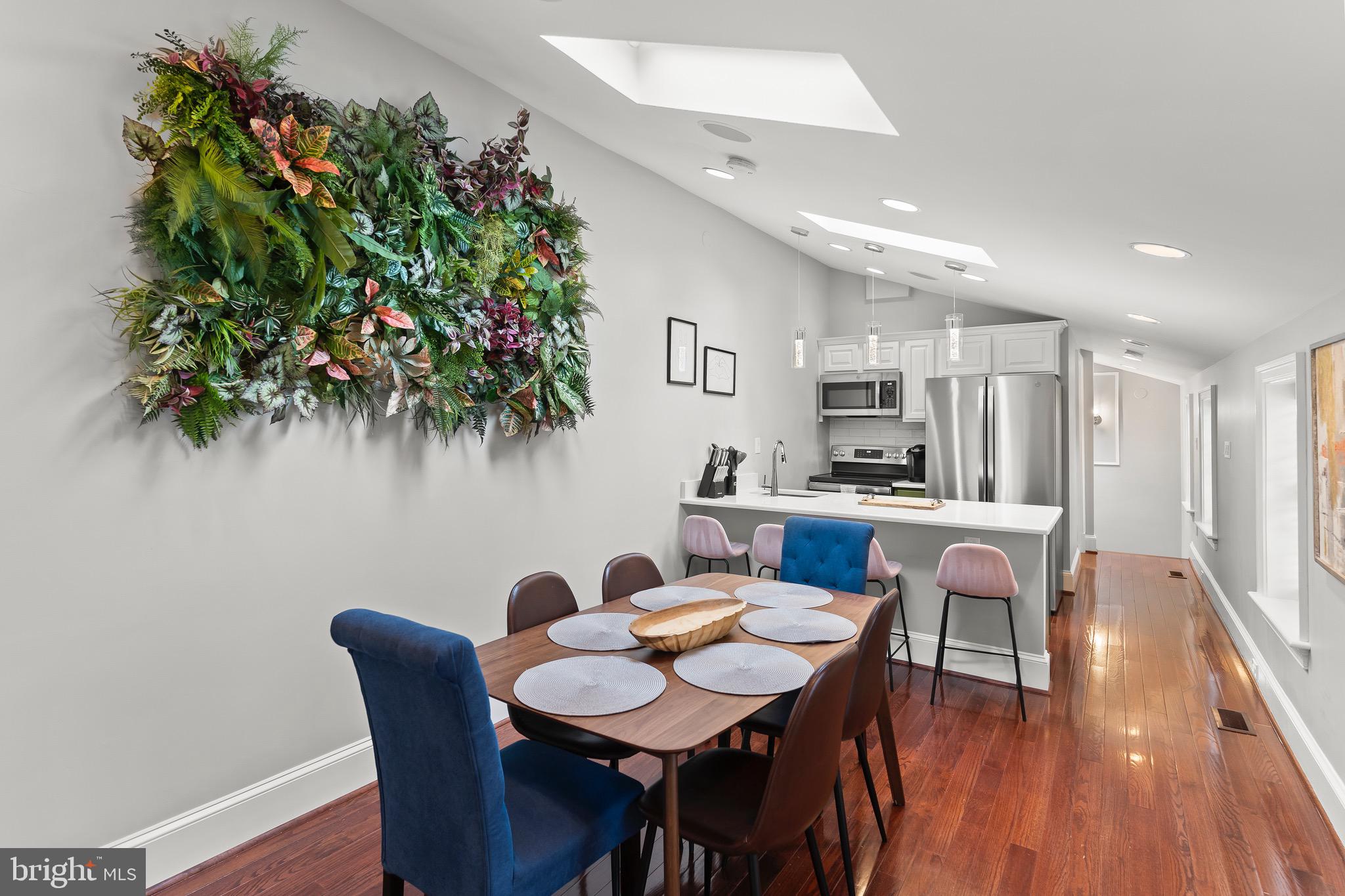 123 South Fayette Street Alexandria, VA 22314 - Photo 29 of 41 a view of a dining room with furniture and wooden floor