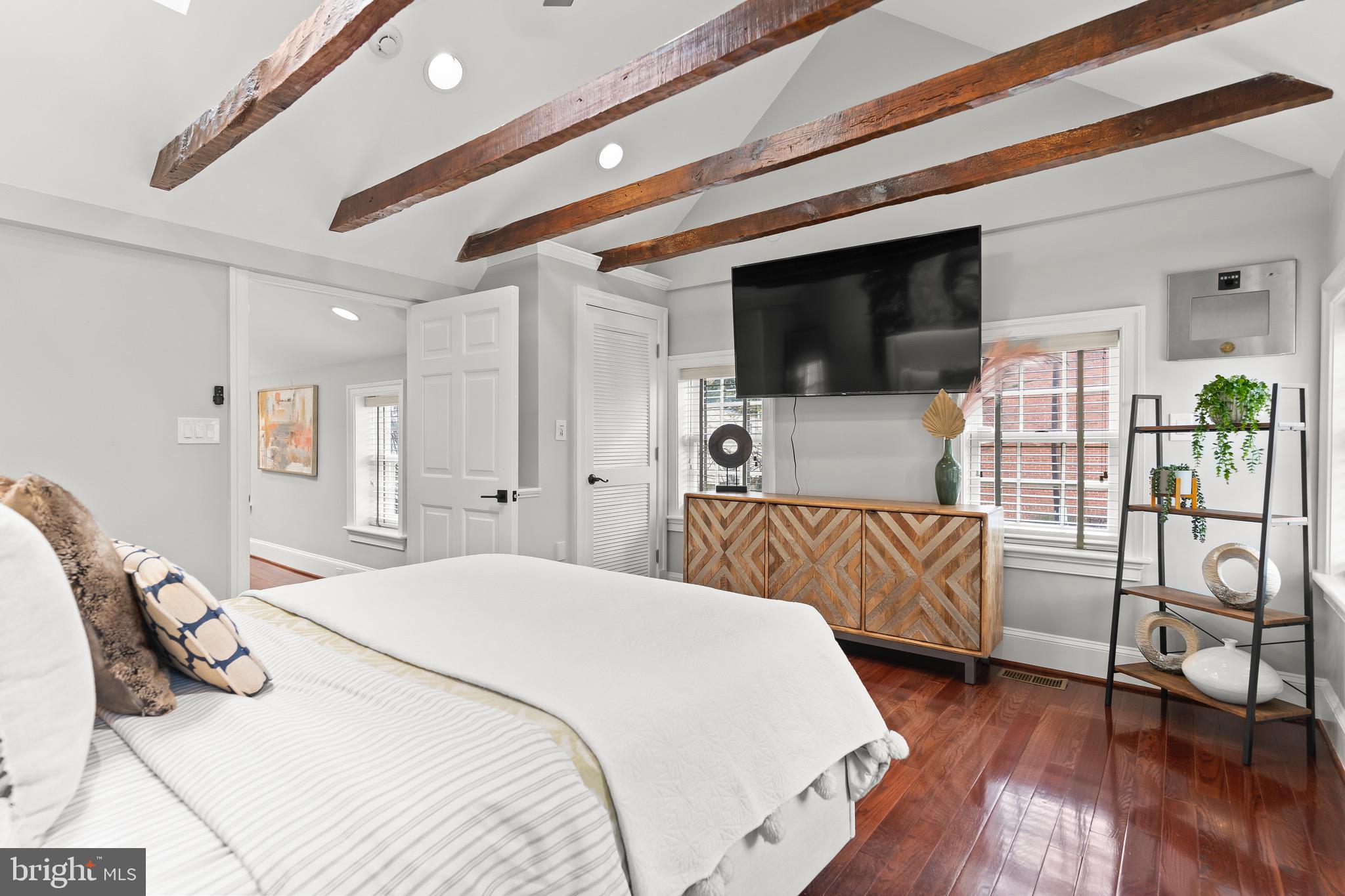 123 South Fayette Street Alexandria, VA 22314 - Photo 34 of 41 a bedroom with a bed and a flat screen tv