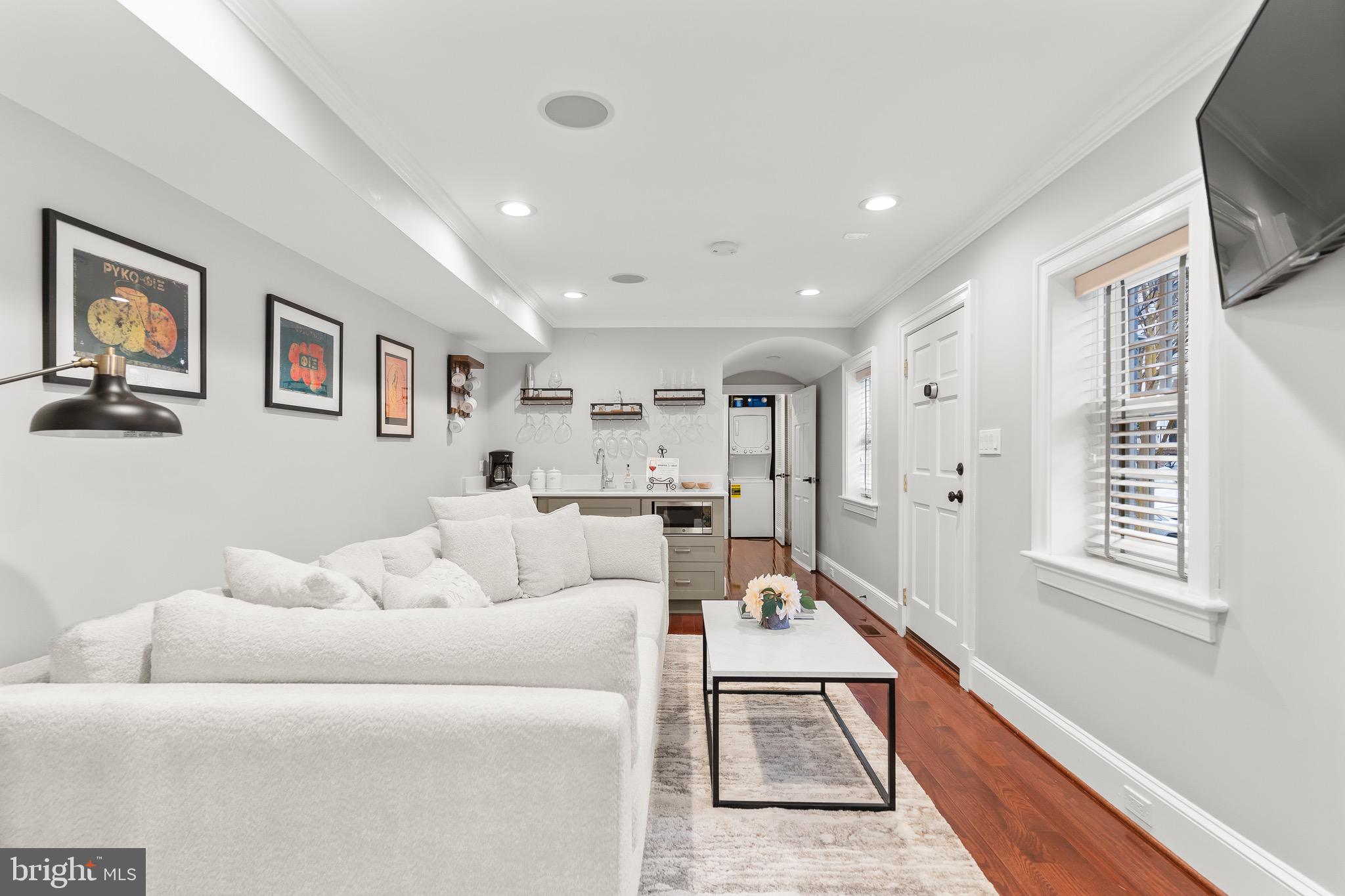 123 South Fayette Street Alexandria, VA 22314 - Photo 8 of 41 a living room with furniture and a flat screen tv