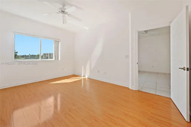 a bathroom with a sink a mirror and a shower