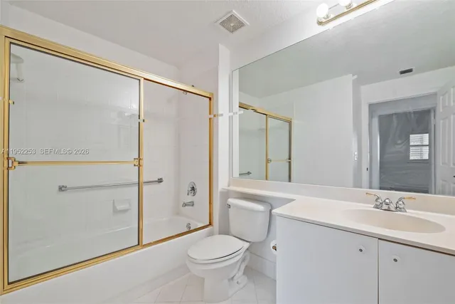 a view of a balcony with wooden floor