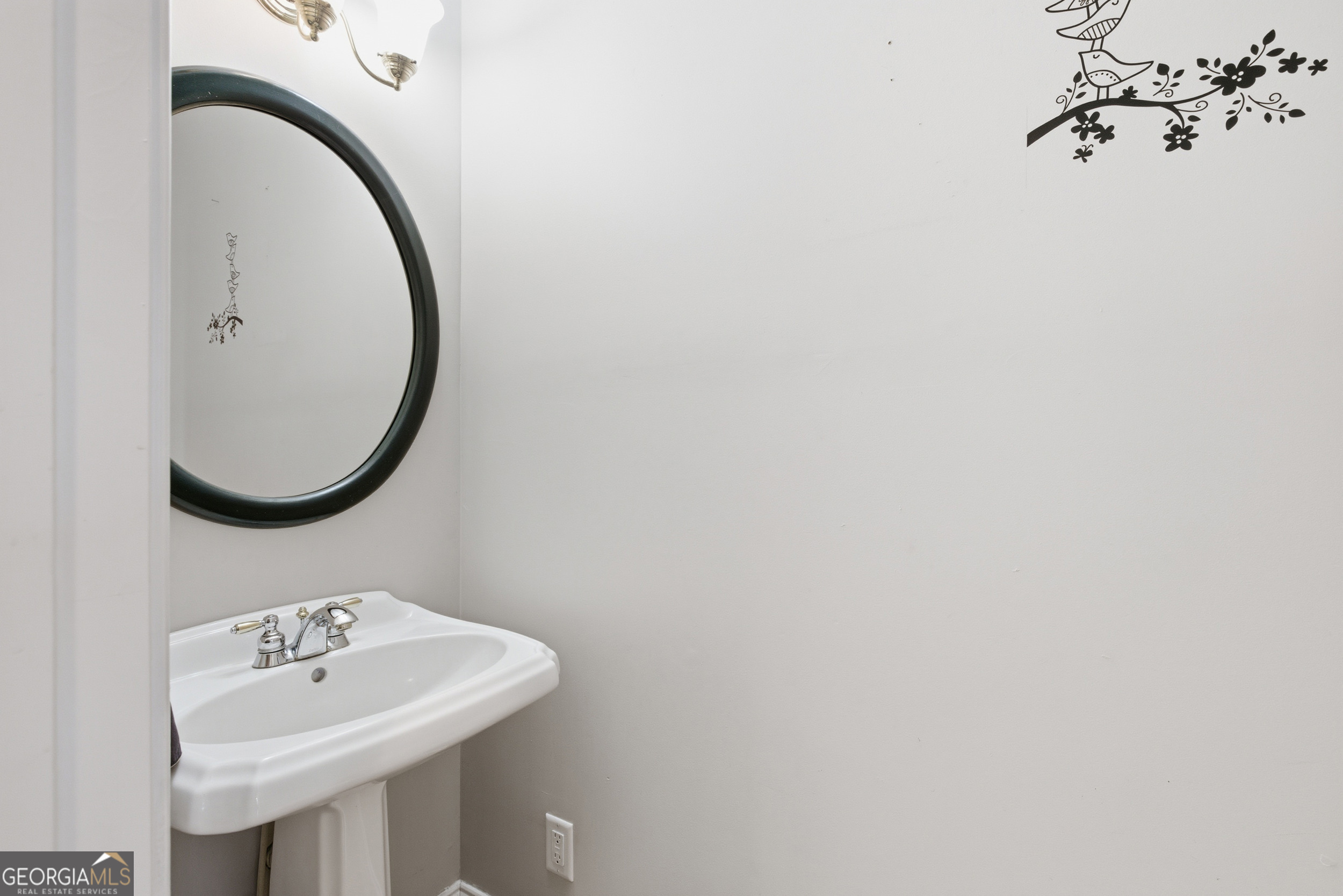 180 Springbrook Drive Cornelia, GA 30531 - Photo 15 of 50 a bathroom with a sink and a mirror