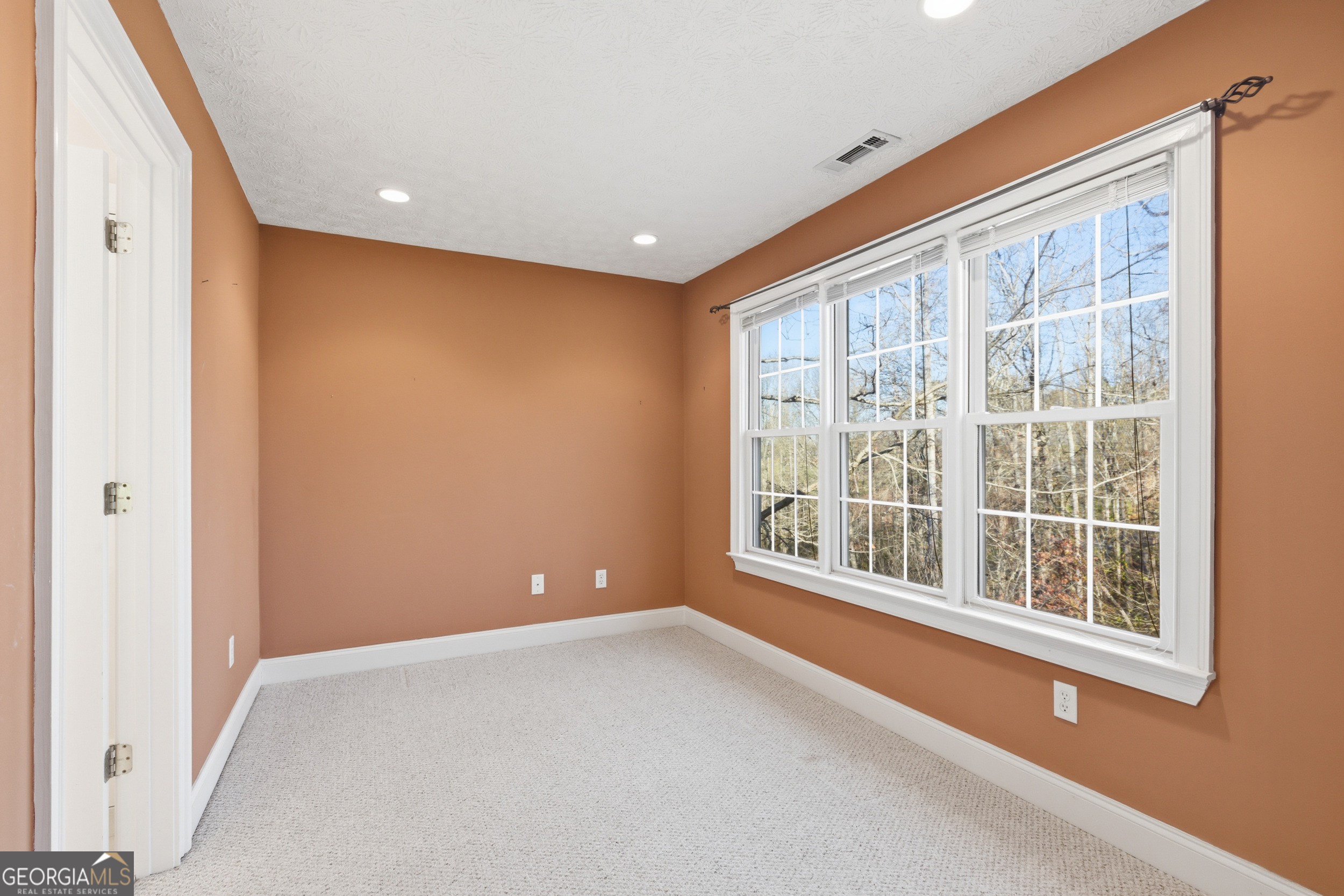 180 Springbrook Drive Cornelia, GA 30531 - Photo 21 of 50 a view of an empty room with a window